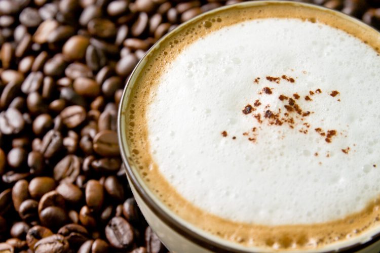 cup of coffee cappuccino on seed copyright: Freepik